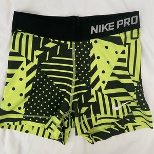 Black/neon Nike pros